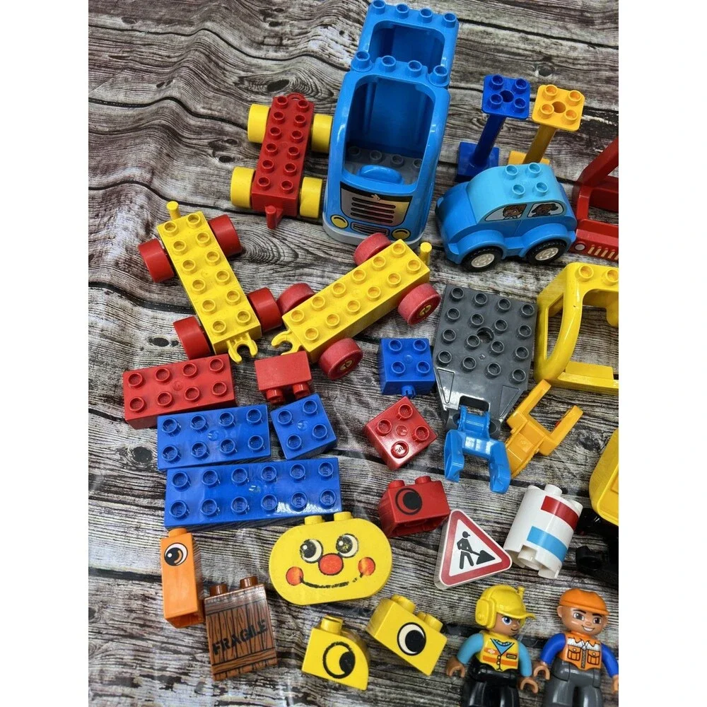 Lot of 100 Lego Duplo Construction W/Minifigs, Trains, Cars, Trucks, Backhoe